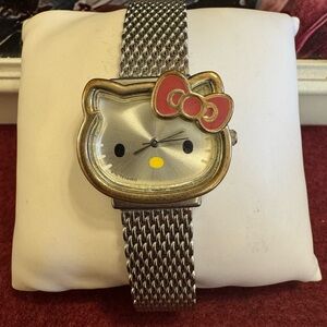 VTG Sanrio Hello Kitty Japan movement silver mesh band watch w/enamel
Pink bow